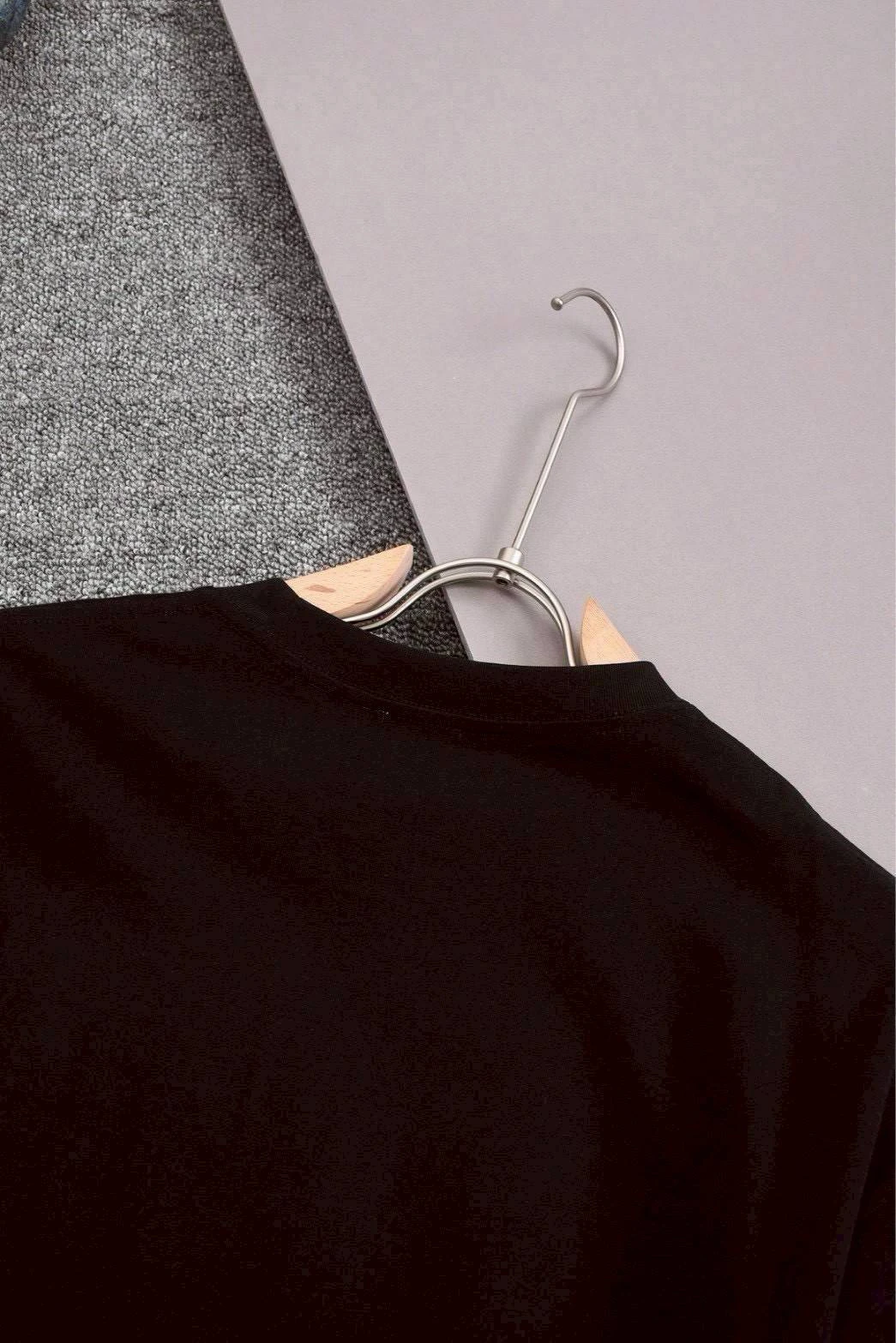 เสื้อสีดำลาย DIOR