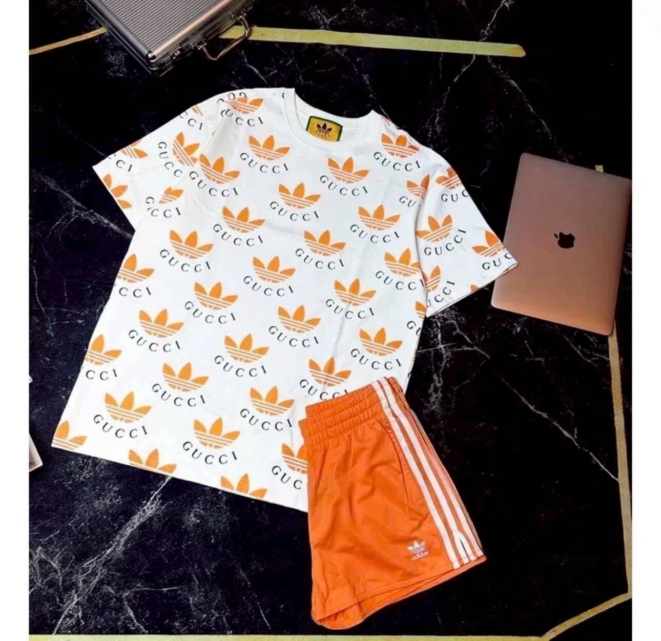ชุดเซตGucci ขาสั้นสีส้ม อกถึง42 เอว 24-30