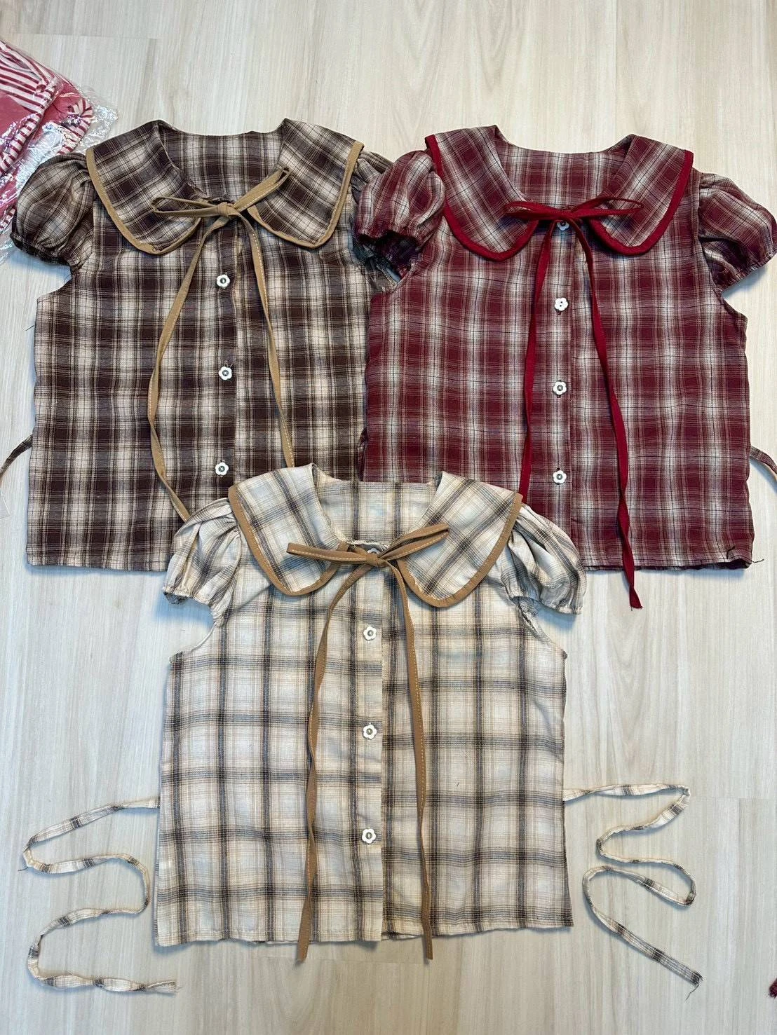 งานเสื้อน่ารักทรงคอบัวแต่งโบว์ผูกเชือก